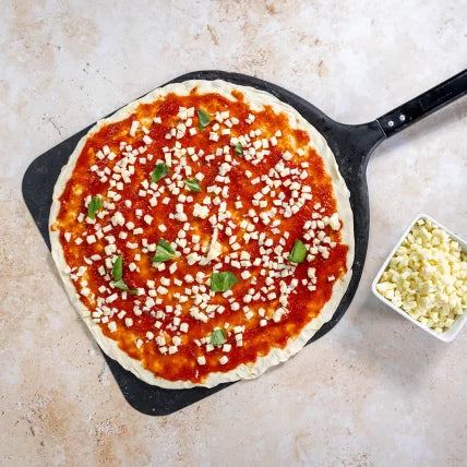 Fior di latte mozzarella cheese, cubed, shown on pizza with diced toppings