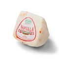 Cheese wedge with red label and visible red pepper flakes on white rind