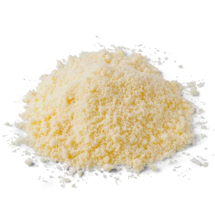 Grated hard vegetarian cheese, pale yellow cheese flakes pile