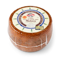 CASTELLI Pecorino Sardo cheese wheel, circular rind with label on top